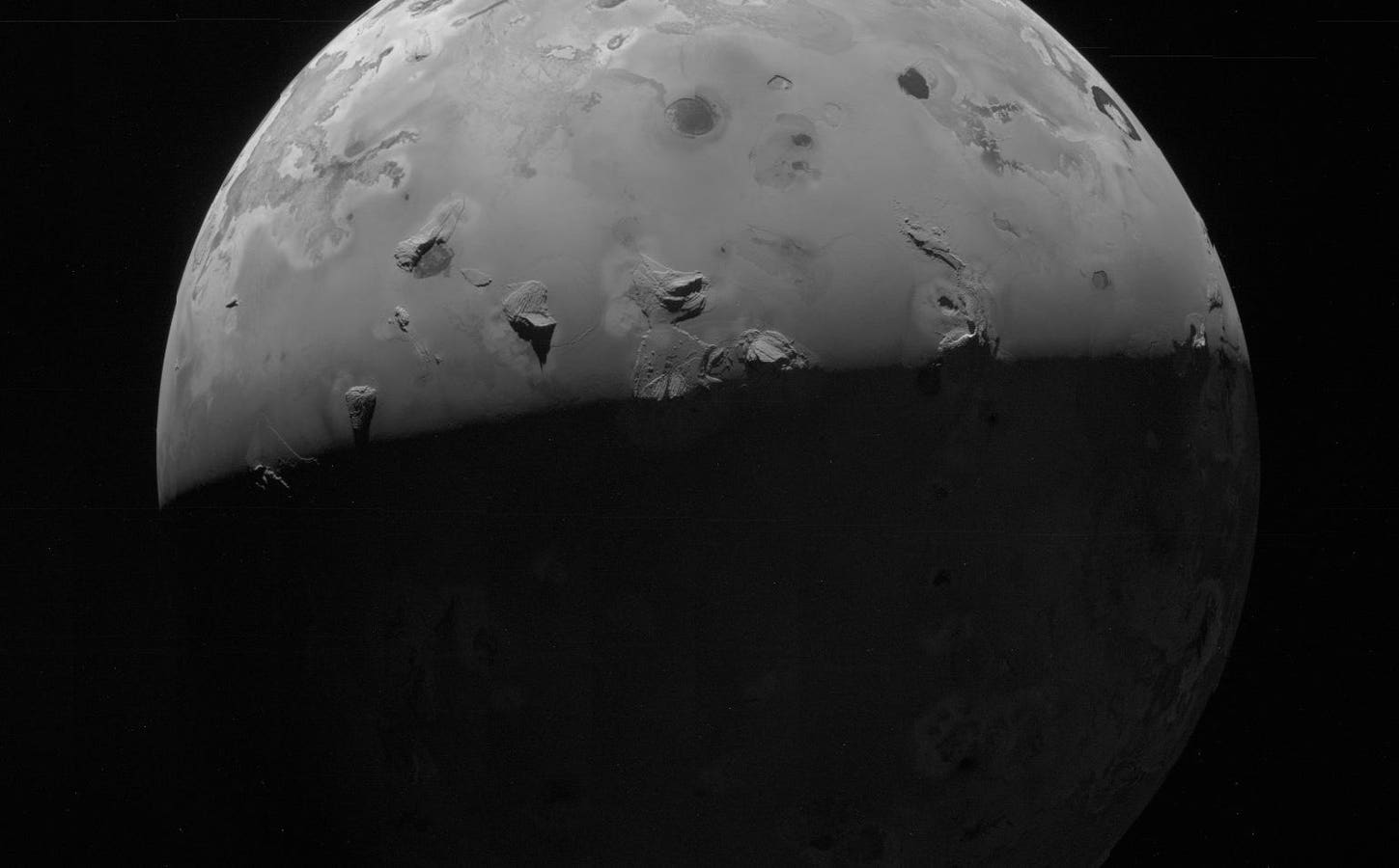 A NASA Spacecraft Just Had A Close Encounter With A Volcanic Moon—See The Stunning First Image