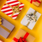 holiday gifts on a yellow background