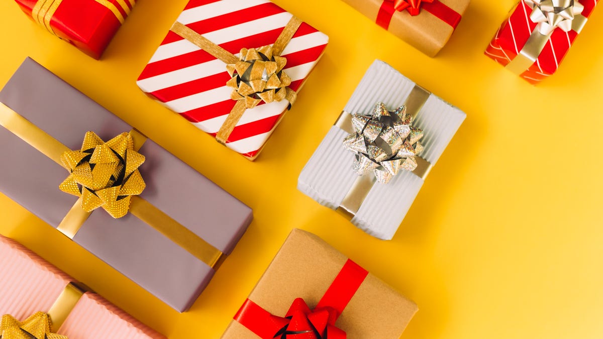 holiday gifts on a yellow background