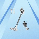 Tineco Vacuum and parts against blue background